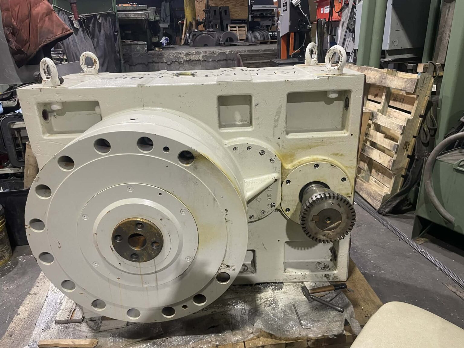 A professionally restored and repainted single-screw extruder gearbox at Zala Machine Co. in Hillsborough, NJ, featuring in-house remachined housing and custom gears.