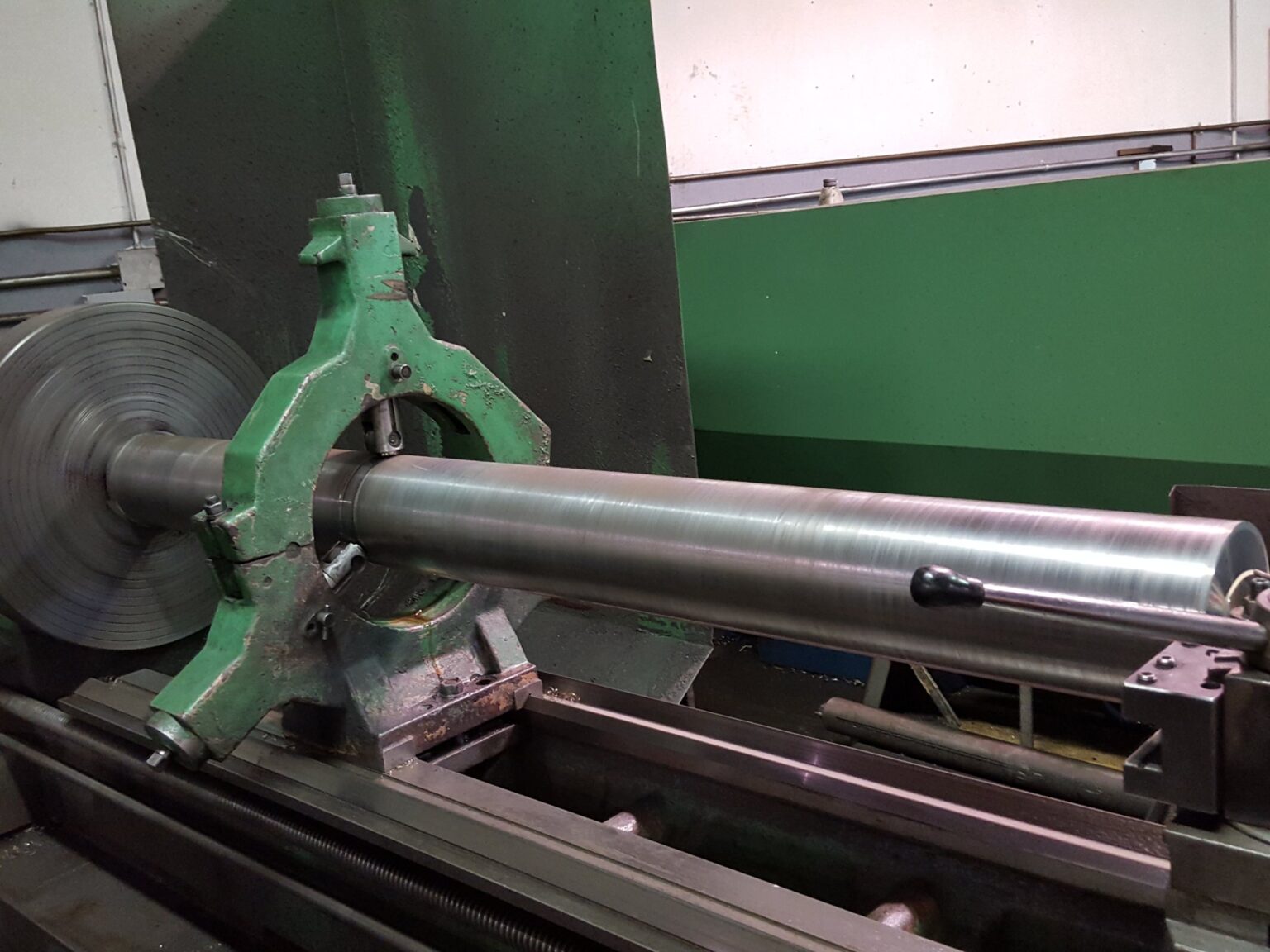 Long shaft turned on the engine lathe, carried in the steady rest to hold it true over the length