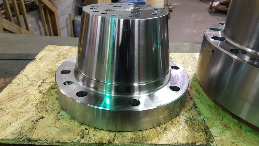 Tapered die bodies finished on their mounting flanges, bolt circles drilled