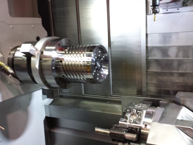 19in spiral mandrel held in the mill-turn chuck, turret tooling and live spindle in the work envelope