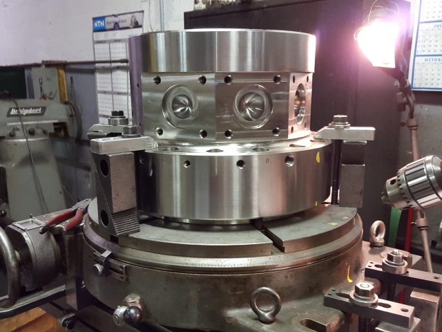 Large die assembly set up on the boring mill
