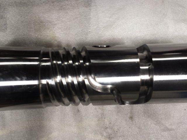 Mixing section of a 4.5in extruder feed screw, barrier flights running into a fluted mixing element