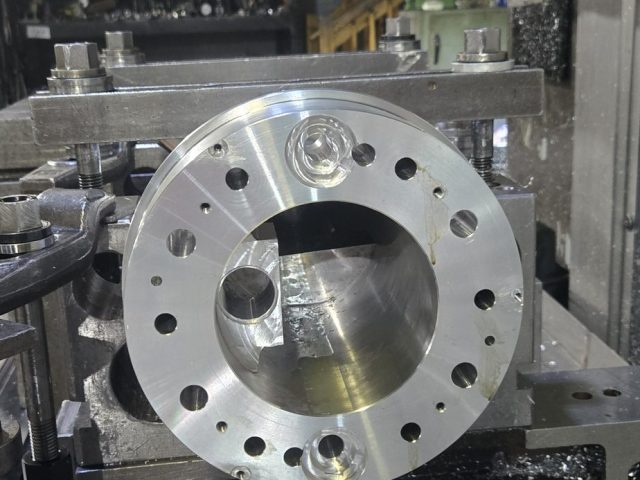 Aluminum prototype block set up on the milling machine for a research project