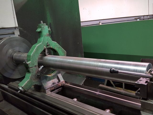 Long shaft turned on the engine lathe, carried in the steady rest to hold it true over the length