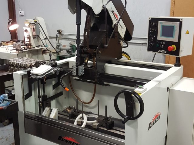 Sunnen honing machine on the shop floor set up for precision bore honing