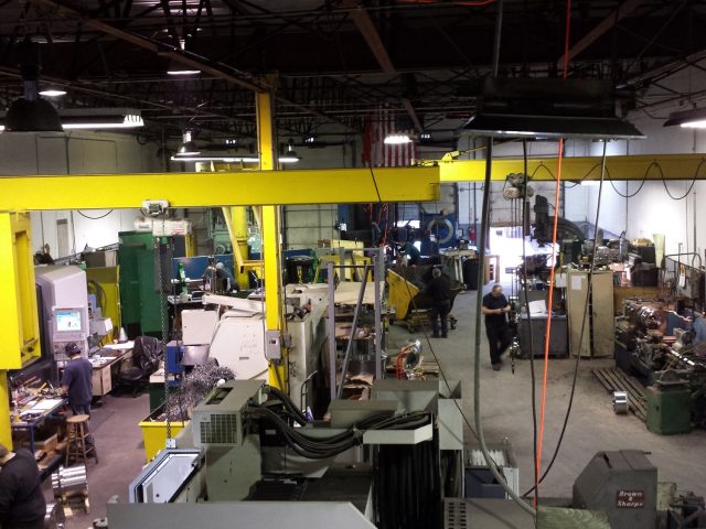 The Zala Machine shop floor in Hillsborough, New Jersey, machines and gantry cranes across the bay